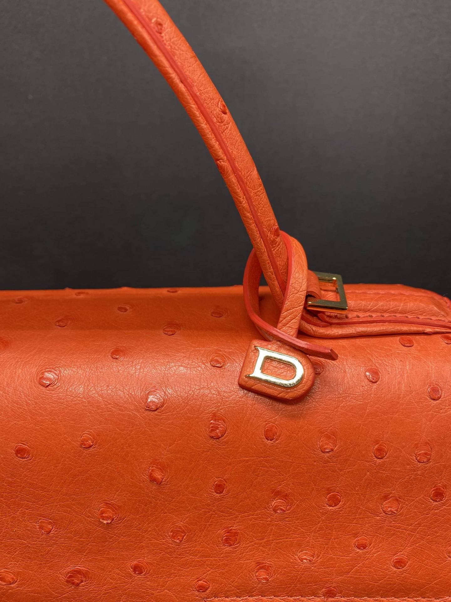Delvaux Tempête in orange Ostrich leather